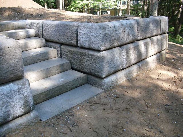 some concrete steps in the middle of a park