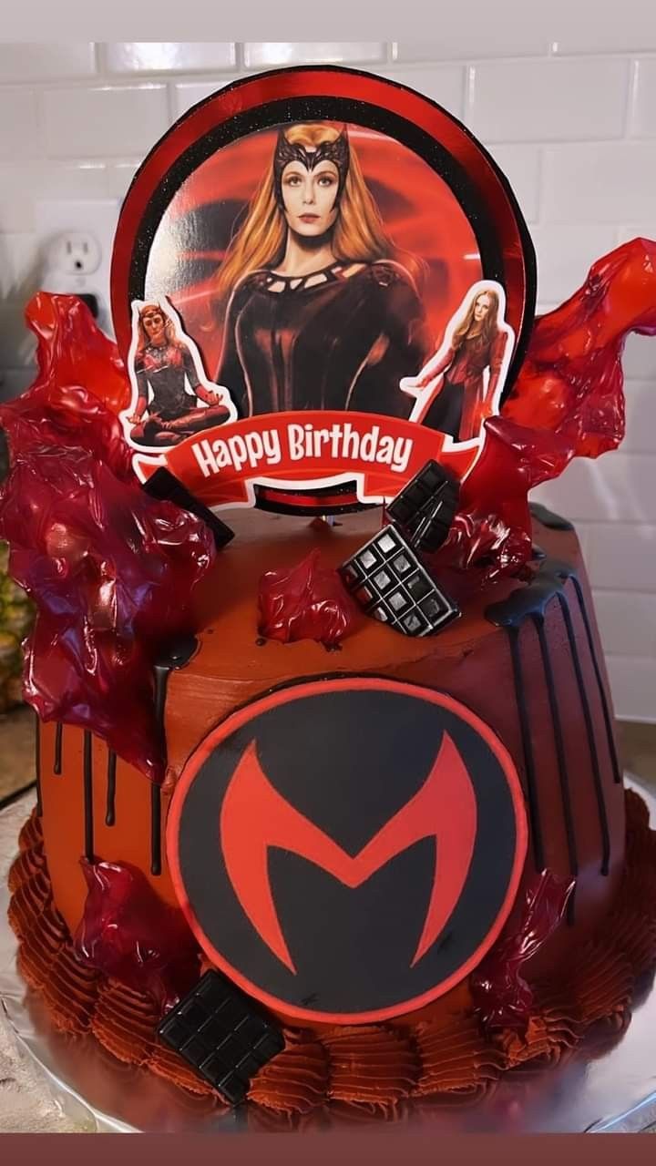 a red and black birthday cake with an image of the incredible spider - man on it