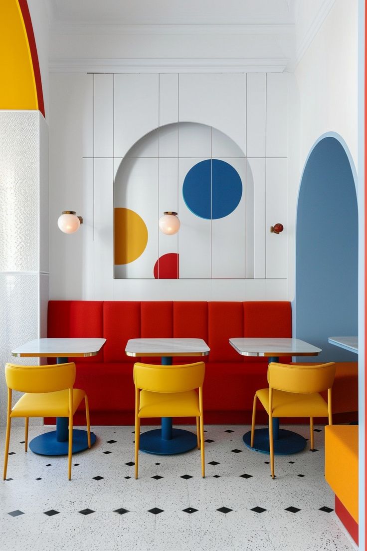 the interior of a restaurant with brightly colored booths