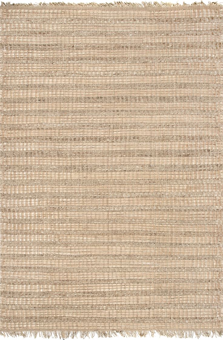 a beige rug with fringes on it