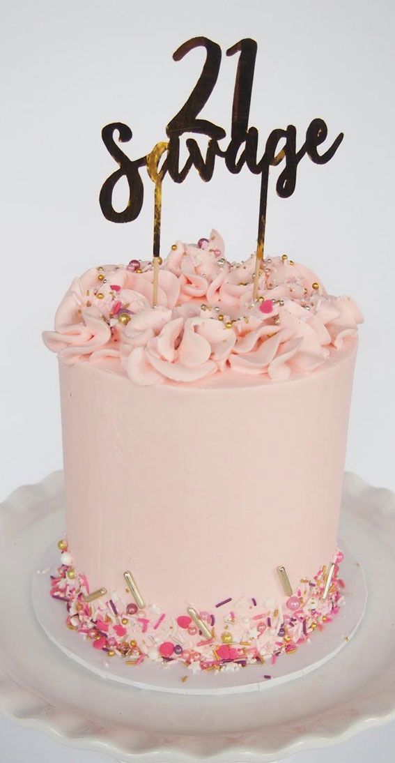 a cake with pink frosting and sprinkles on it that says,'24 judge '