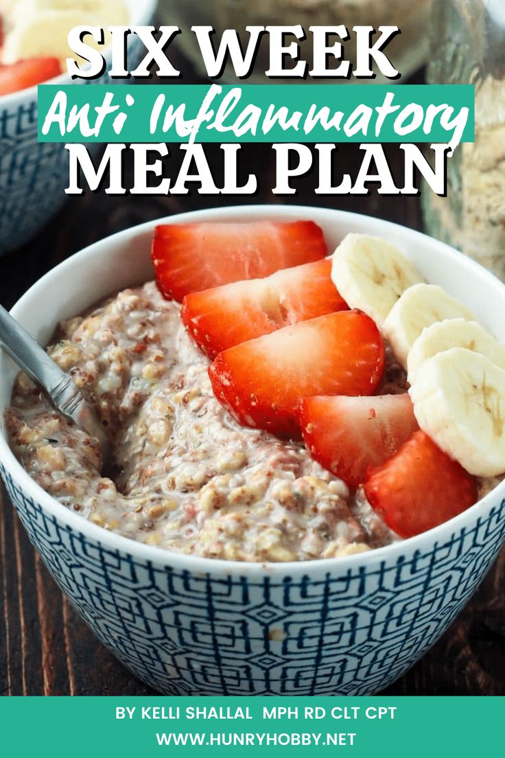 a bowl of oatmeal with strawberries and bananas