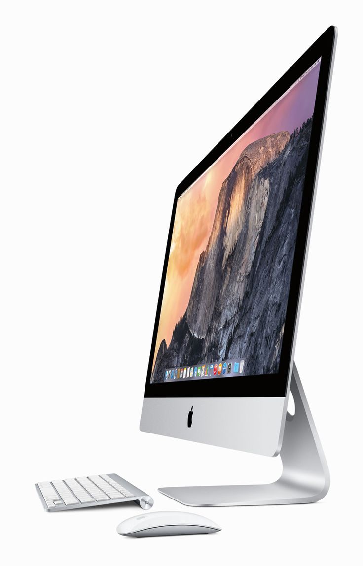 an apple desktop computer sitting on top of a white desk next to a keyboard and mouse