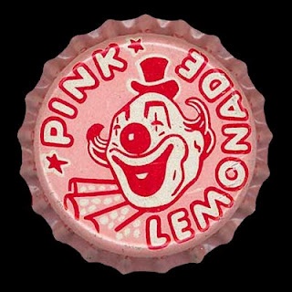 a bottle cap with an image of a clown on it