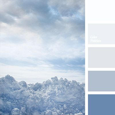 the sky is filled with clouds in shades of blue and gray, including light grey