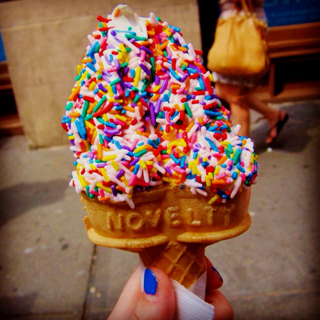 an ice cream cone with sprinkles on top