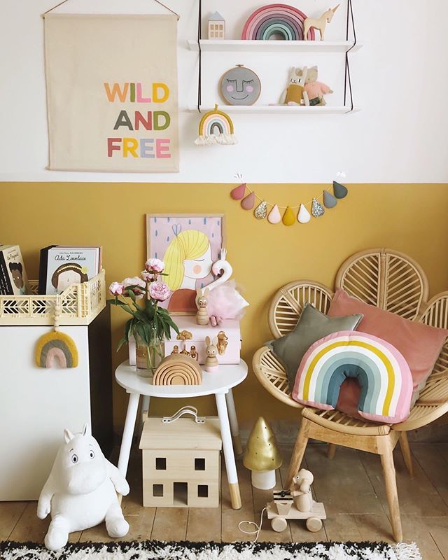 a child's playroom with toys and decor