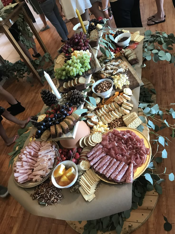 a table filled with lots of different types of food