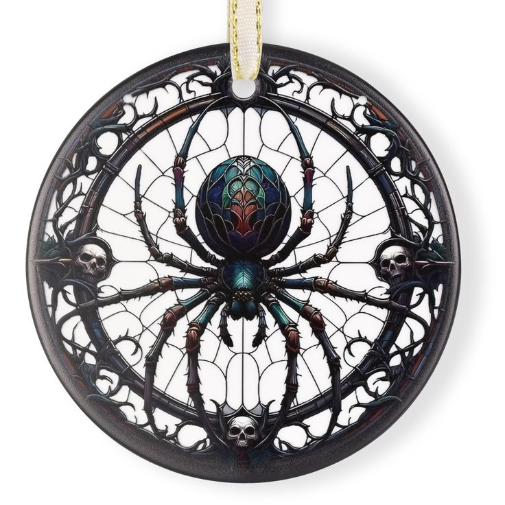 a spider is hanging from a circular metal decoration