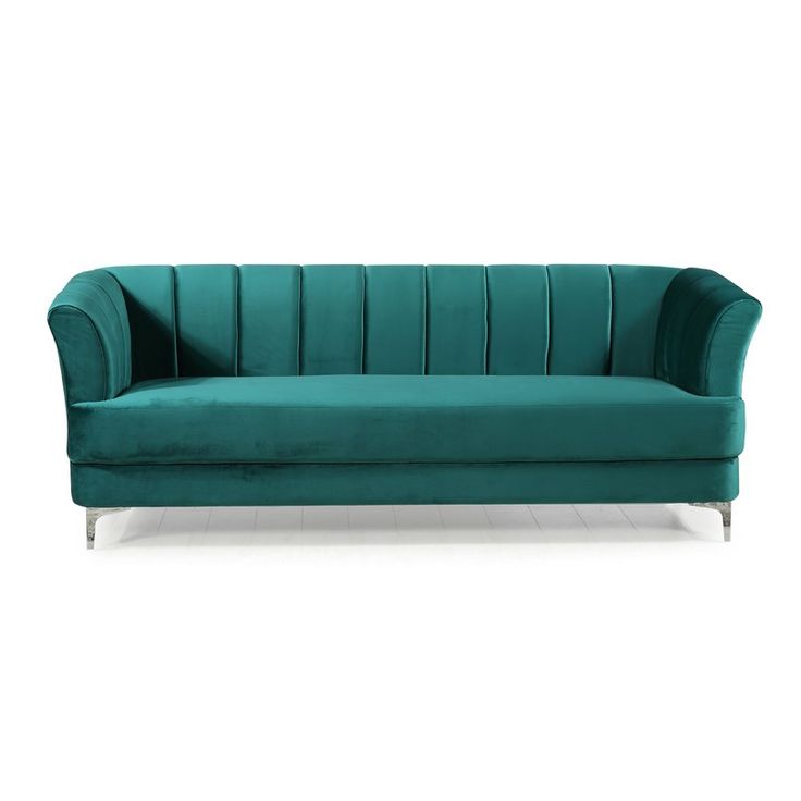 a green velvet sofa with chrome legs and arm rests on a white floor, facing the camera