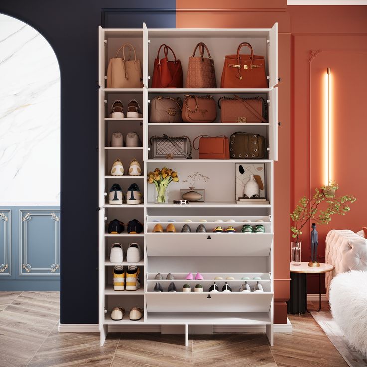 a white shelf filled with lots of purses and shoes