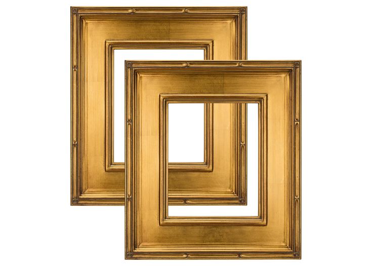 three gold framed art pieces on a white background