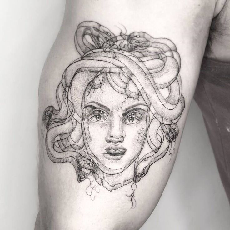 a woman's face with an octopus on her arm and head in the background