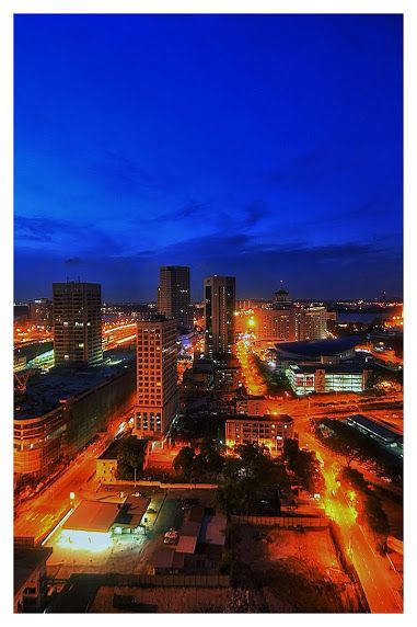 an aerial view of a city at night