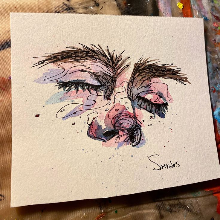 a drawing of a woman's face with her eyes closed and painted in watercolor