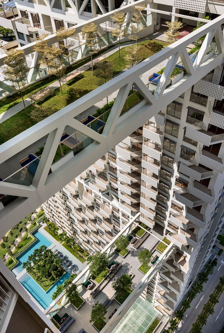 an aerial view of some buildings and swimming pool