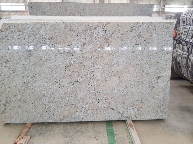 a large slab of granite in a warehouse