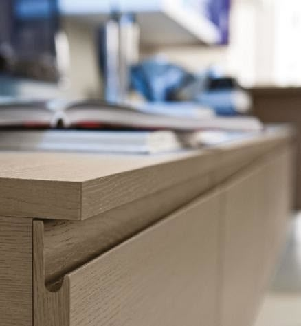 a close up view of the drawers on a desk