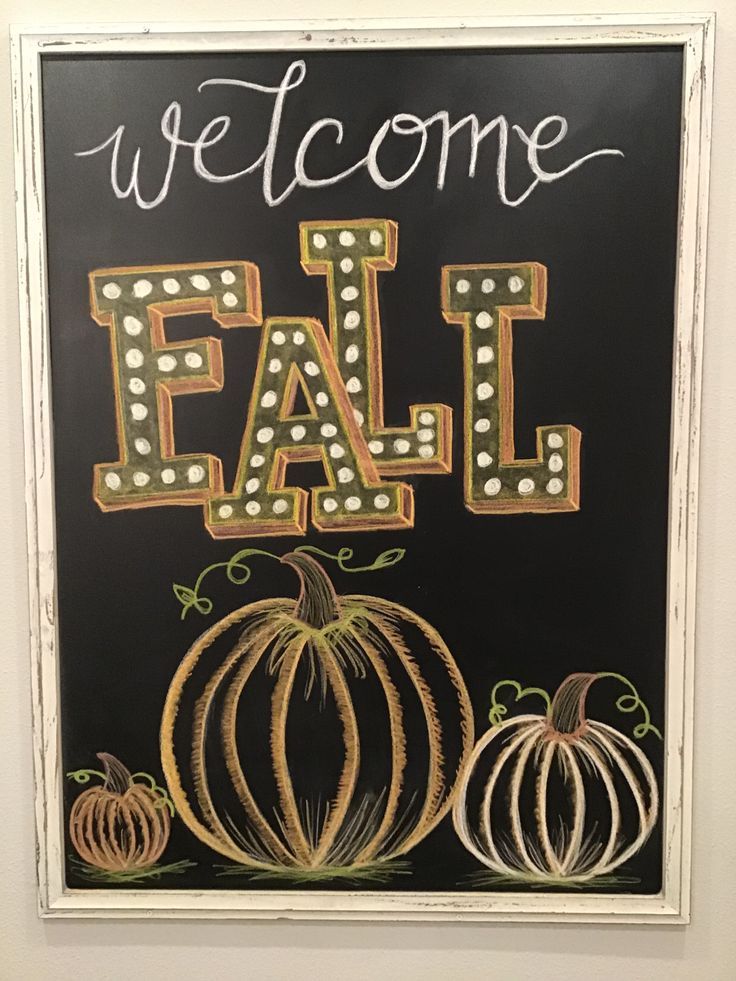 a chalkboard sign that says welcome fall