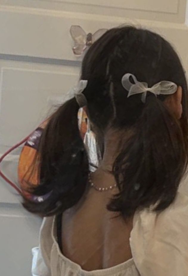 Pigtails With Bows Aesthetic, Pink Tails Hairstyle, Short Ribbon Hairstyles, Braid Pigtails Half Up Half Down, Low Pigtails Aesthetic, Wavy Hair Pigtails, Short Hairstyles With Bows, Cute Hairstyles Pigtails, Side Part Pigtails