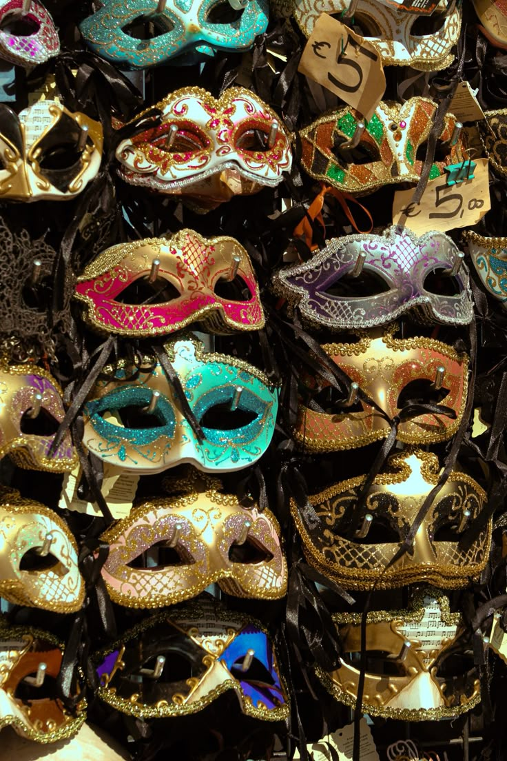 many different colored masks on display for sale