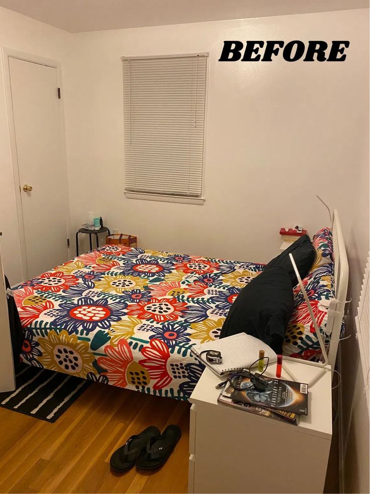 a bed room with a neatly made bed