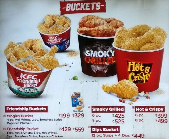 an advertisement for fried chicken buckets with prices on the front and back pages in english