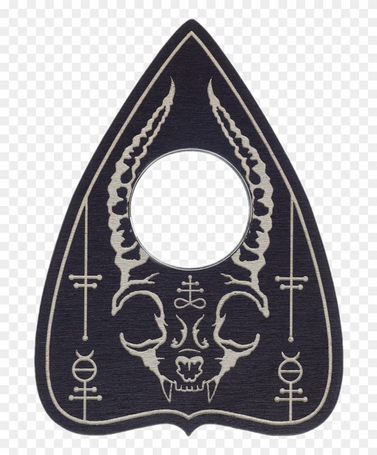 a black and white image of a skull with horns on it's head, in the shape of a triangle