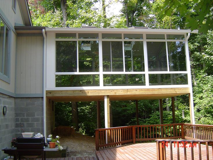 a house that is sitting in the woods