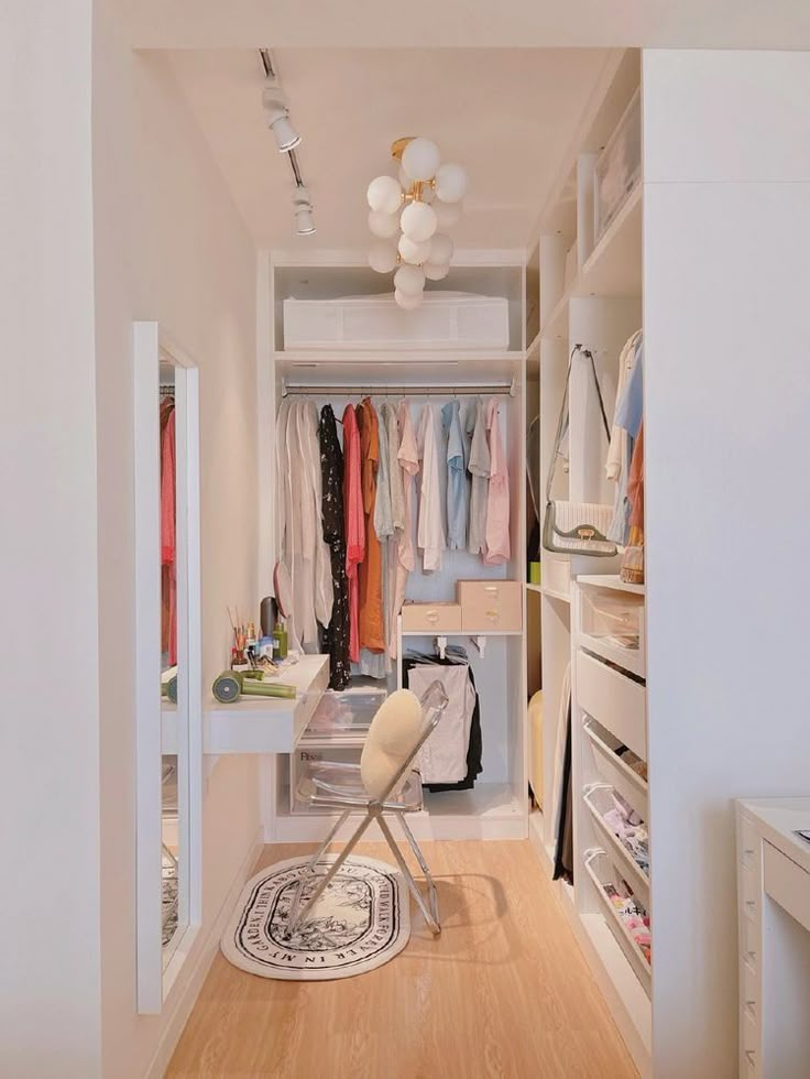 a walk in closet filled with lots of clothes