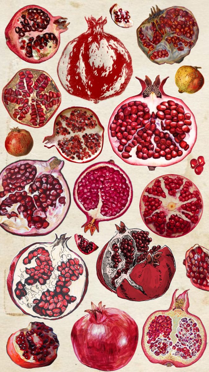 a bunch of pomegranates that are on a table