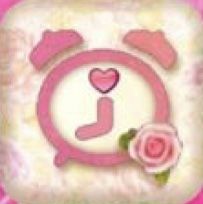 a pink clock with hearts and a rose on it