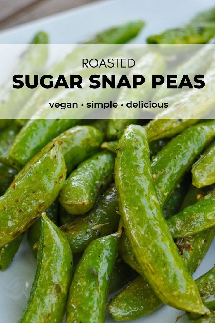 roasted sugar snap peas on a white plate