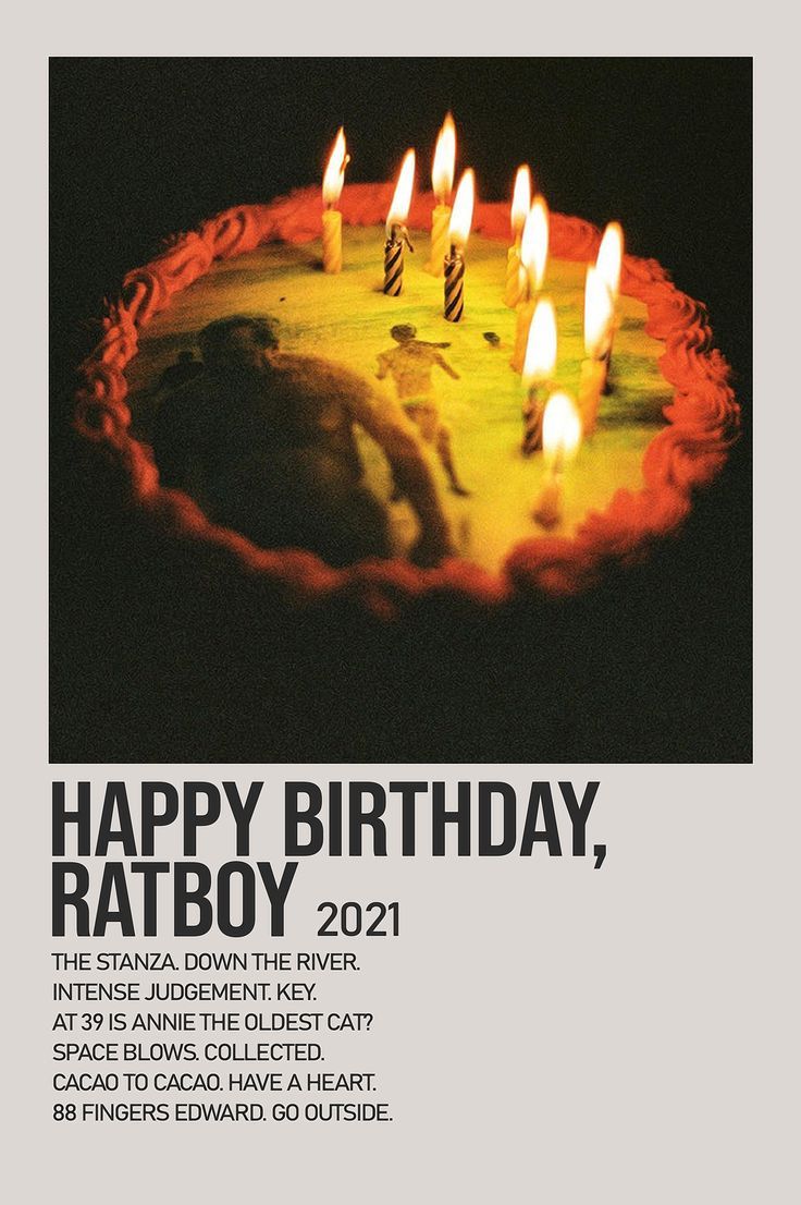 a birthday cake with lit candles on it and the words happy birthday, ratboy