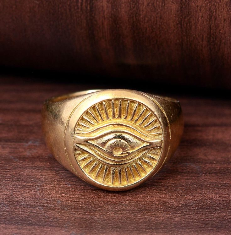 "Evil Eye Ring, Gold Ring, Dainty Ring, Minimalist Brass Ring, Eye Ring, Signet Ring, All Seeing Eye Ring, Personalized Gift, Bohemian Ring Size:- All Size Available In Variation Metal:- Brass IMPORTANT NOTE....👇 1 product free gift on purchase of 3 products. You can choose the free gift as your wish. Take a screenshot of the free gift you like from my shop and send me a photo in personal message. MUST READ....👇 5 stars is my shop's priority. So contact me before leaving any negative review. I Adjustable Brass Signet Ring For Promise, Adjustable Symbolic Signet Ring Tarnish Resistant, Adjustable Metal Signet Ring, Symbolic Gold Round Midi Rings, Symbolic Gold Midi Rings, Adjustable Symbolic Midi Rings, Evil Eye Ring Gold, Beautiful Gold Rings, Angel Ring