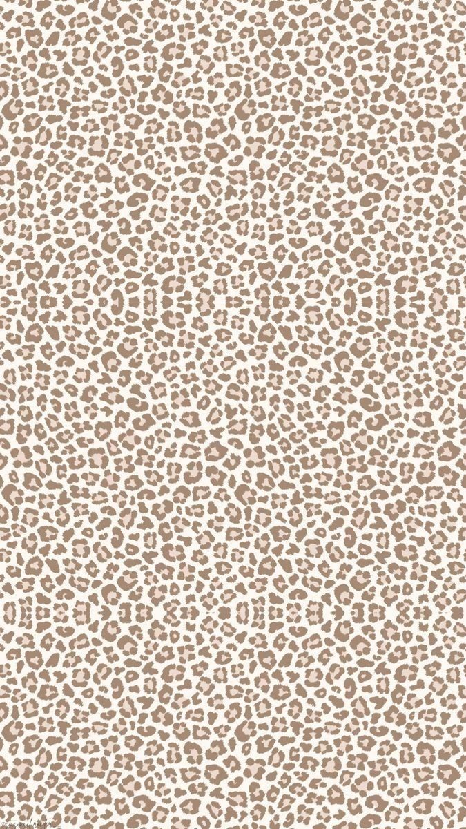 a white and brown animal print wallpaper with lots of small spots on it's surface