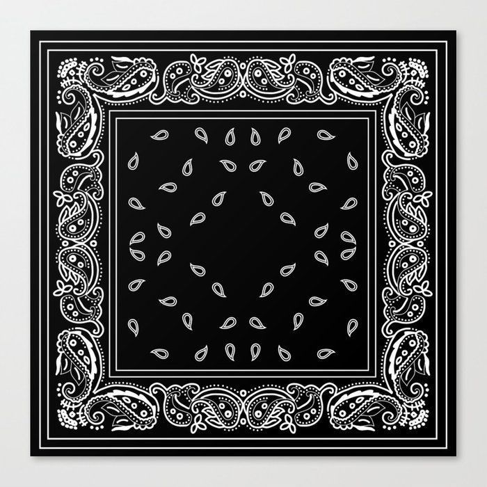 a black and white bandanna with paisley designs