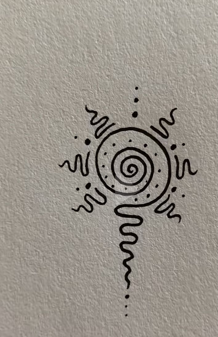 a drawing on the side of a wall with an image of a spiral in it