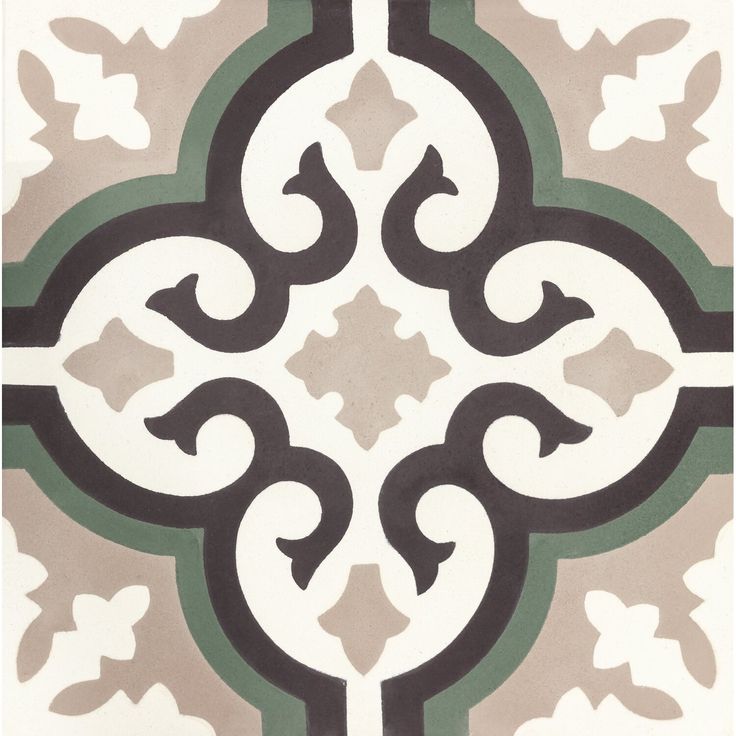 a white and black tile with an ornate design