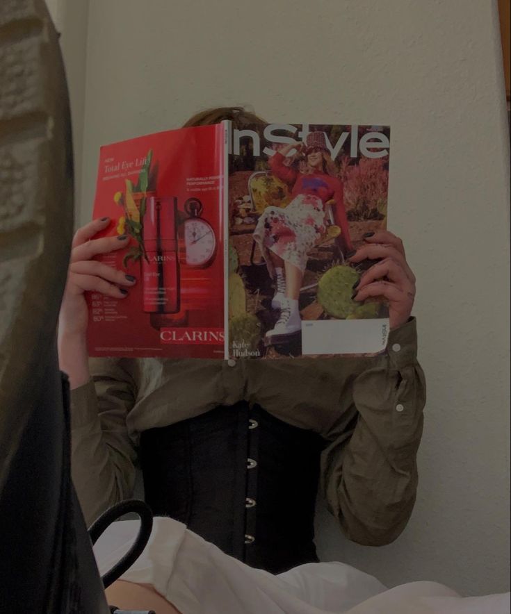 white dress with green shirt and black underbust corset outfit with doc martins aesthetic Reading Magazines Aesthetic, Reading Magazine Pose, Reading Magazine Aesthetic, White Dress With Corset, Zine Cover, Reading Magazine, Magazine Aesthetic, Magazine L, Teaser Video