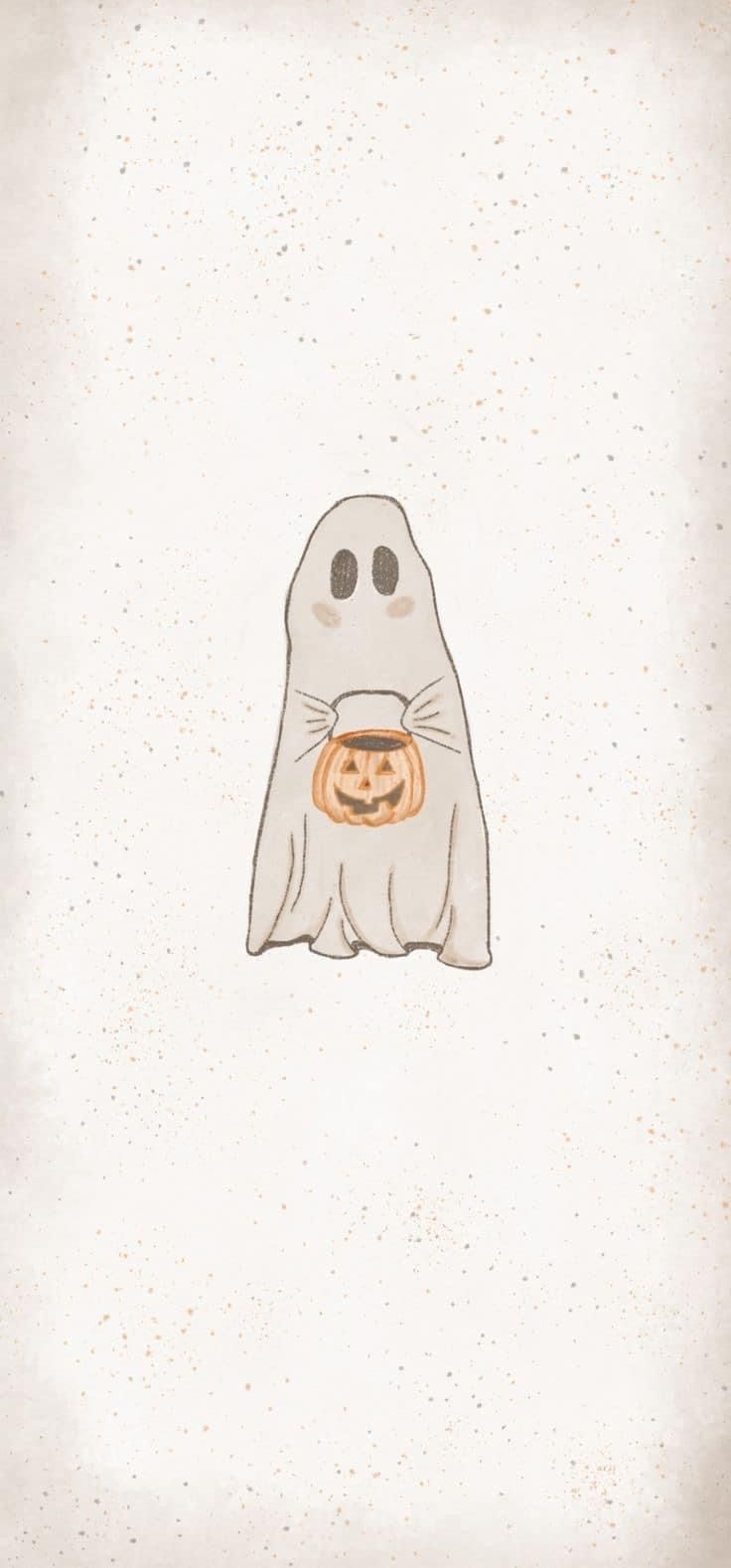 a ghost with a pumpkin in its mouth