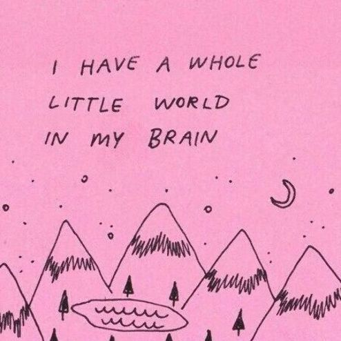 i have a whole little world in my brain written on pink paper with mountains and trees