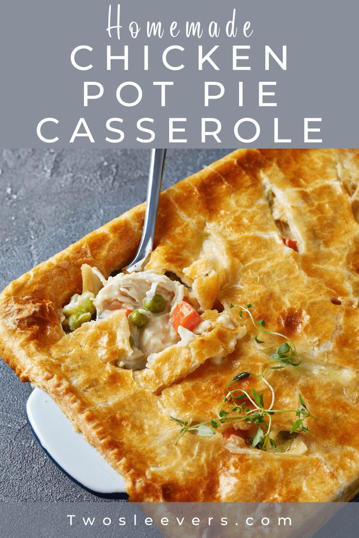 chicken pot pie casserole in a white dish with a fork on the side