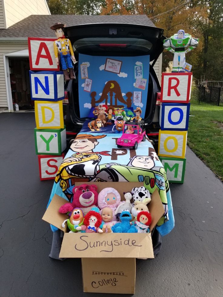 an open trunk with toys in it on the back of a truck that says sunnyside