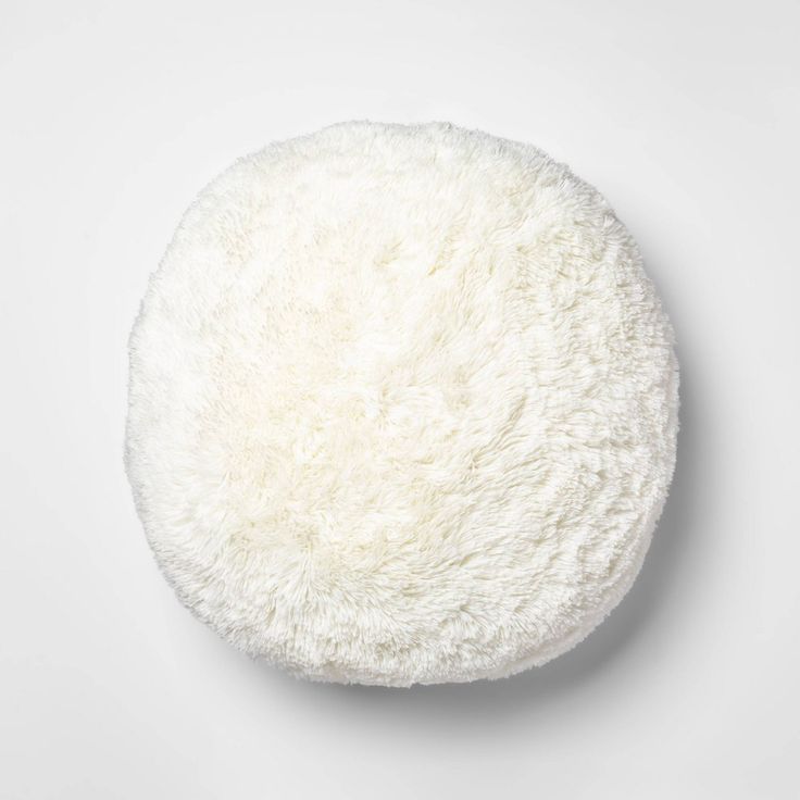 a white round object on a white surface