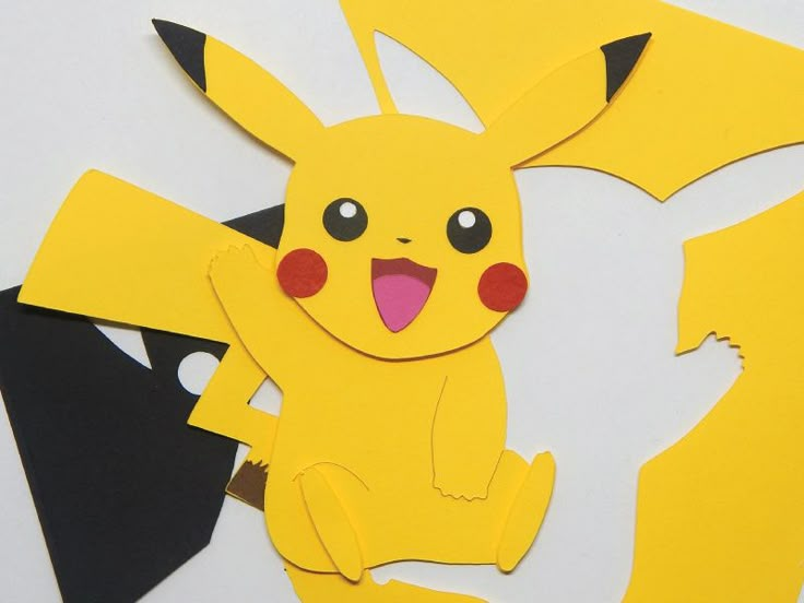 paper cut out of the shape of a pikachu