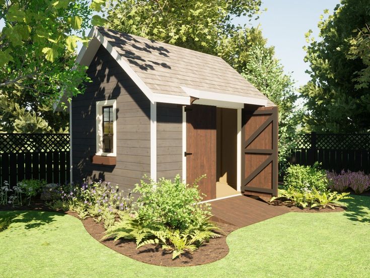 a small shed in the middle of a yard