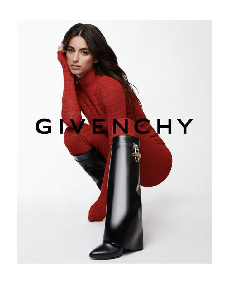 a woman in red sweater and black boots posing for a magazine cover with the words givenchy on it