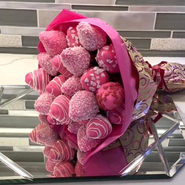 a bouquet of pink and white heart shaped candies