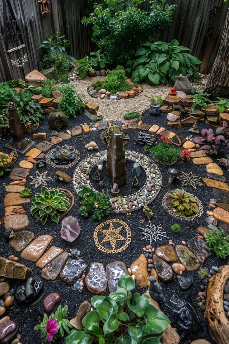 an outdoor garden with rocks and plants in the shape of a wheel on top of it